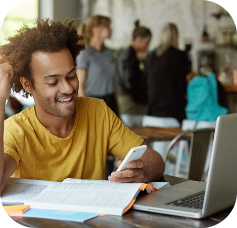 joyful-african-american-student-sitting-at-wooden-2021-08-30-23-10-28-utc